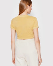 Load image into Gallery viewer, Reebok Natural Dye Fitted Crop T-Shirt in Pastel Gold - Bisy Clothing
