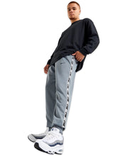 Load image into Gallery viewer, Nike Dri-FIT Tape Joggers in Grey (2025)