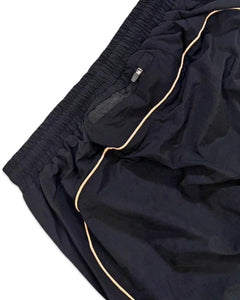 Syna World Can’t Rush Greatness Shell Tracksuit in Rose Gold and Black (2025)
