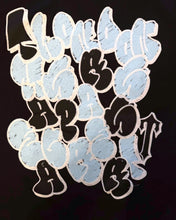 Load image into Gallery viewer, Trapstar Wall to Wall Graffiti Tee in Black (2026)